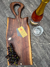 Load image into Gallery viewer, CH242 - 24" x 9" Live Edge Black Walnut with Pearl Red Epoxy Charcuterie Board / Serving Tray
